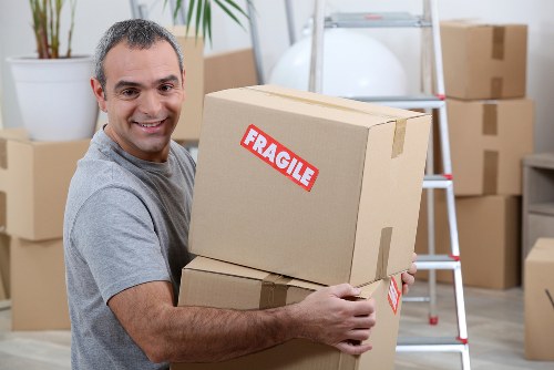 Urgent same day removals service in Kingston upon Thames with moving van and boxes