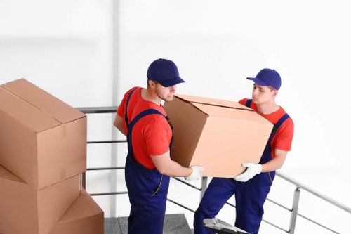 Loading furniture into a van for a move in Kingston upon Thames