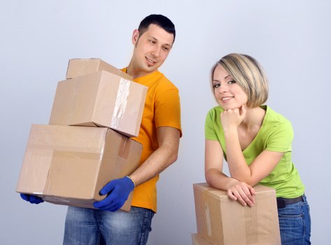 Donation-ready furniture and reusable items being loaded for charity reuse