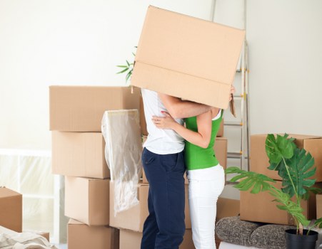 Packed boxes and furniture ready for local house removals