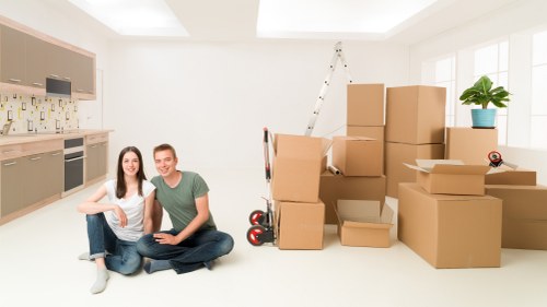 Professional moving team securing items for transport safely