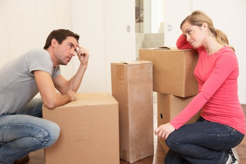 Local moving truck loading boxes and furniture in Kingston upon Thames
