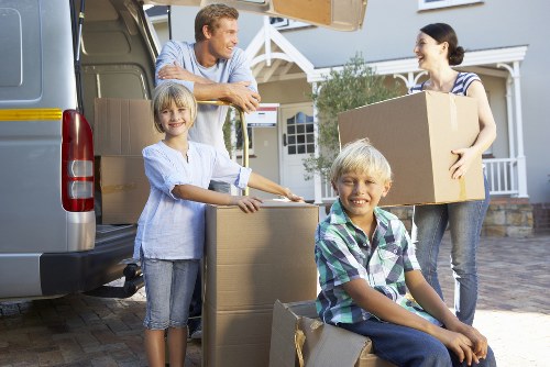 Staff checking items and protective packing before a move