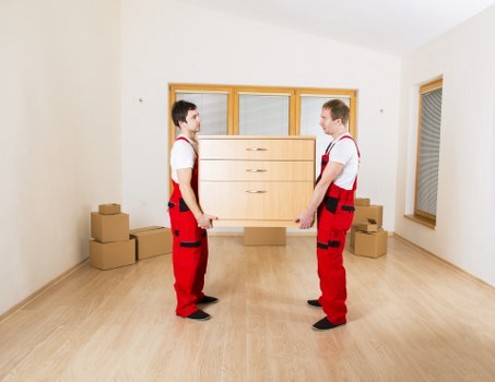 Professional removal team handling furniture during a Kingston upon Thames move